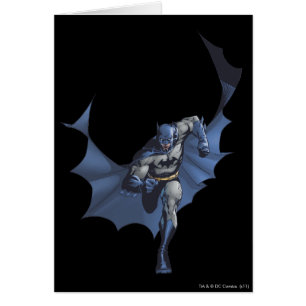 Batman läuft mit fliegendem Kap