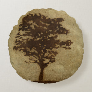 Baum-Silhouette auf Bronzehintergrund Rundes Kissen