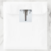 Baumstämme im Schnee Quadratischer Aufkleber (Tasche)