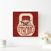 Be Strong Quadratische Wanduhr (Zuhause)
