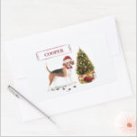 Beagle Funny Christmas Dog mit Baum Rechteckiger Aufkleber<br><div class="desc">Ein niedlicher Beagle trägt ein Weihnachtskleid humorvoll. Mit Blick auf einen Baum verließ er kalte Pfoten. "Paws" und schicken lustige Weihnachtsgeschenke.</div>