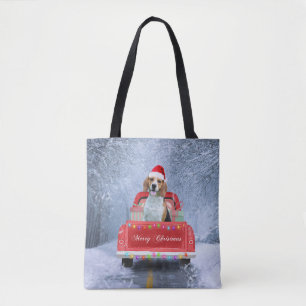 Beagle Hund im Schnee sitzen im Weihnachtswagen Tasche