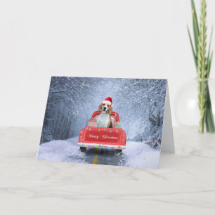 Beagle-Hund im Schnee sitzend im Weihnachts-LKW Karte