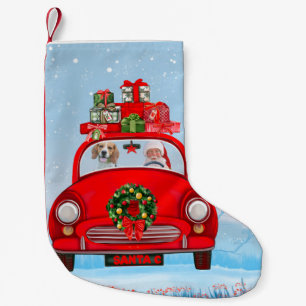 Beagle mit dem Weihnachtsmann im Auto Kleiner Weihnachtsstrumpf
