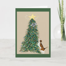 Beagle mit Waschbär im Weihnachtsbaum