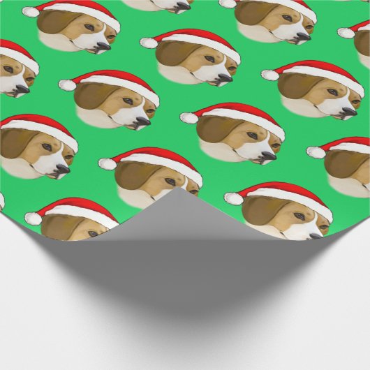 Beagle zu Weihnachten in einer Weihnachtsmannmütze Geschenkpapier (Ecke)