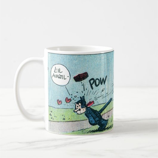 "Beaned by a Brick" Wrap-Around-Bild Tasse (Links)