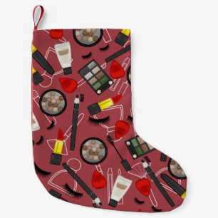 Beauty-Produktmuster auf einem roten Hintergrund Kleiner Weihnachtsstrumpf