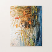 Beaver sitting by pond among reeds puzzle (Vertikal)