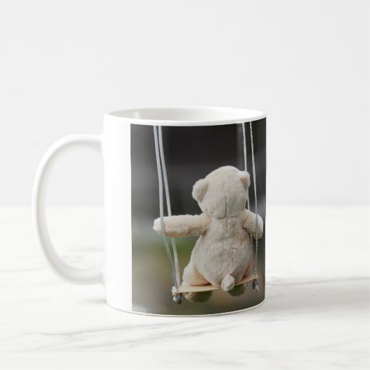 Beer op Schommel in beweging. Kaffeetasse (Links)