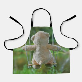 Beer op schommel vanaf de rug. schürze