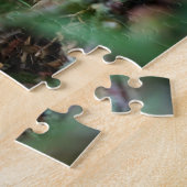 Beertje dat bij kampvuur zit. puzzle (Seite)