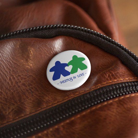 Begegnungen in der Liebe, Blauer und grüner Knopf Button