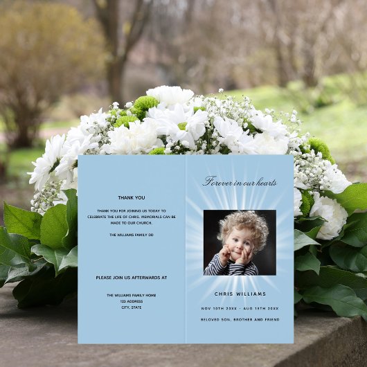 Begräbnisprogramm für Blaue Fotos