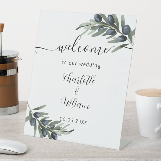 Begrüßung mit Olivenblättern Sockelschild (In Situ)