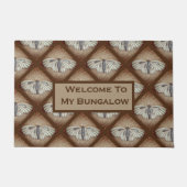 Begrüßungszeichen mit Moths Fußmatte (Vorderseite)