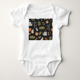 Behagliche Herbstelemente: Warmes Muster. Baby Strampler