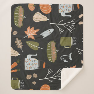 Behagliche Herbstelemente: Warmes Muster. Sherpadecke