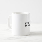 Behalten Sie die Unterhaltung Kaffeetasse (Vorderseite Links)