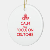 Behalten Sie Ruhe und Fokus auf Krücken Keramikornament (Links)