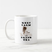 behalten Sie ruhiges und Getränkteekätzchen Kaffeetasse (Links)