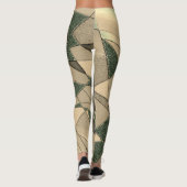 Beige dreieckige Ausschnitt auf dunkelgrünem Hinte Leggings (Rückseite)