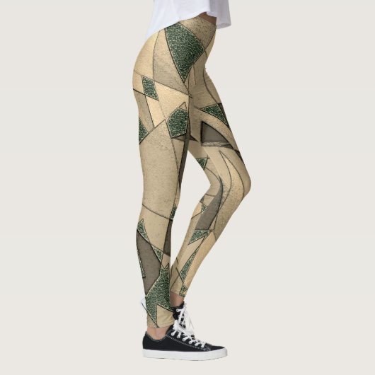 Beige dreieckige Ausschnitt auf dunkelgrünem Hinte Leggings (Rechts)