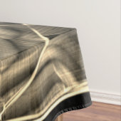 Beige gebogene Bänder, kontrastiert durch geprägte Tischdecke (Beispiel)