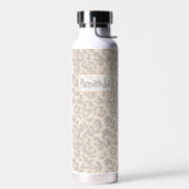 Beige Leopardendrucke. Trinkflasche (Links)