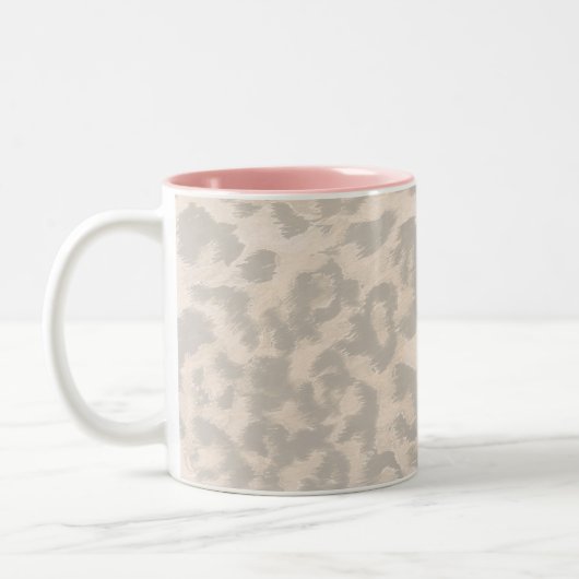 Beige Leopardendrucke. Zweifarbige Tasse (Links)