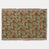 Beige Pfauenfedern auf Schokoladenbraun Decke (Vorderseite)