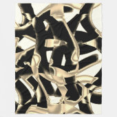 Beige und schwarze Schrotte, zerstörtes Band auf k Fleecedecke (Vorderseite)