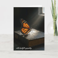 Beileid Monarch Butterfly Auf der Heiligen Bibel