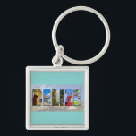 Belize Tropical Beach Blue Ocean Travel Fotos Schlüsselanhänger<br><div class="desc">Zeigen Sie allen Ihre Liebe für das Land Belize mit dieser unterhaltsamen Kette mit Aussichten auf die Ruinen von Ambergris Caye,  Caye Caulker und Maya. Eine wunderschöne Farbkollage wird über eine tropische Badeortszene aufgezwungen. Sie können die Hintergrundfarbe des Schlüsselanhängers nach Ihren Vorlieben ändern.</div>