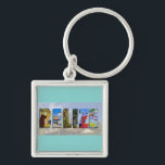 Belize Tropical Beach Blue Ocean Travel Fotos Schlüsselanhänger<br><div class="desc">Zeigen Sie allen Ihre Liebe für das Land Belize mit dieser unterhaltsamen Kette mit Aussichten auf die Ruinen von Ambergris Caye,  Caye Caulker und Maya. Eine wunderschöne Farbkollage wird über eine tropische Badeortszene aufgezwungen. Sie können die Hintergrundfarbe des Schlüsselanhängers nach Ihren Vorlieben ändern.</div>