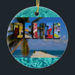 Belize Tropical Beach Blue Ocean Weihnachten Keramik Ornament<br><div class="desc">Erleben Sie Ihre Liebe für das Land Belize in dieser Urlaubssaison mit diesem hellen Weihnachtsschmuck mit Fotos von Ambergris Caye,  Caye Caulker und Maya-Ruinen. Eine prächtige Farbcollage wird über eine exzentrische tropische Strandszene mit Palmen und Dock aufgezwungen. Der Hintergrund enthält ein Bild eines schönen blauen Ozeans.</div>