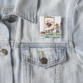 Bemannen Sie das Halten eines Malerpinsels und das Button (Beispiel)