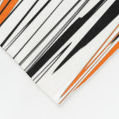 Bengalische Farbtöne in orangefarbenen und schwarz Fleecedecke (Ecke)