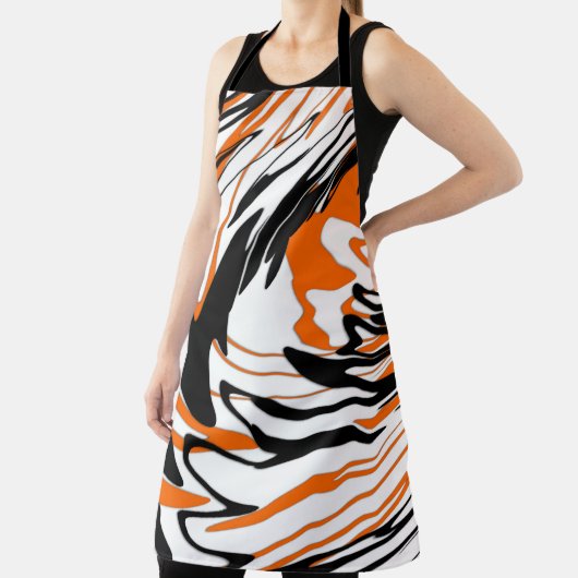 Bengalische Farbtöne in orangefarbenen und schwarz Schürze (InSitu)