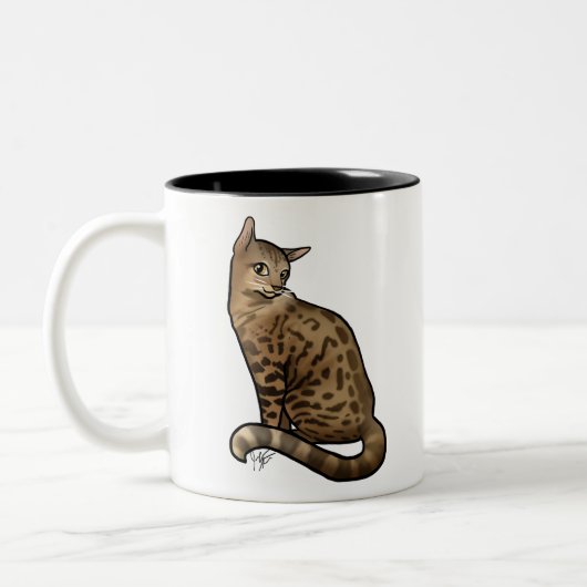 Bengalische Katzen mit Gepunkteten Mänteln Zweifarbige Tasse (Links)