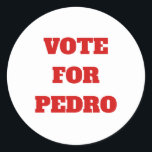 Benutzerdefinierte Text-/Farbabstimmung für Pedro  Runder Aufkleber<br><div class="desc">Gehen Sie raus und wählen Sie bei der nächsten Wahl! Dieses politische/parody-Design verfügt über einen klassischen weißen Aufkleber mit Vote For Pedro in geblocktem rotem Druck. Dieser Aufkleber ist vollständig anpassbar! Sie können die Hintergrundfarbe, den Schriftart oder den Text ändern, wenn Sie möchten. Klicken Sie einfach auf die Schaltfläche Personalisieren,...</div>