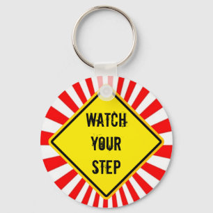 Beobachten Sie Ihren Schritt Schlüsselanhänger