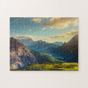 Berge und Tal am Sonnenuntergang Puzzle