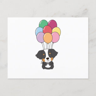 Berner Sennenhund fliegt mit bunten Luftballons Postkarte