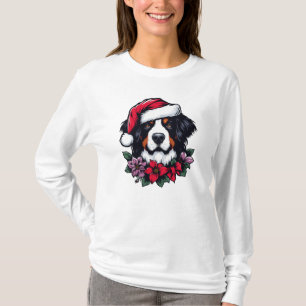 Bernese Hund mit Weihnachtsmannmütze und Florals T-Shirt