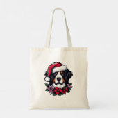 Bernese Hund mit Weihnachtsmannmütze und Florals Tragetasche (Rückseite)