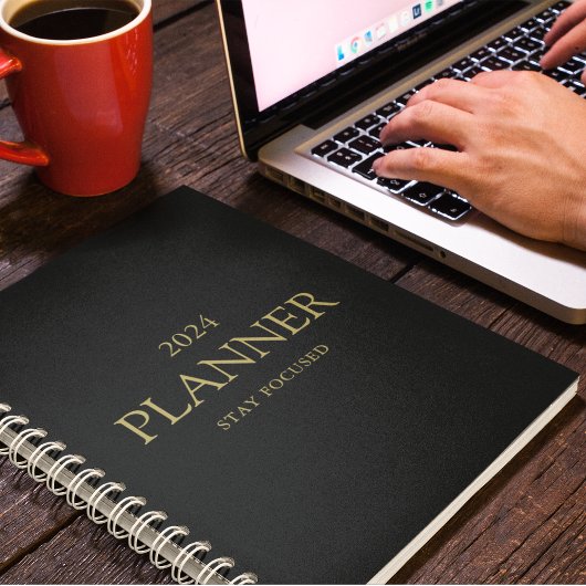 Berufliches goldfarbenes und schwarzes Bleibe Zita Planer