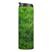 Beschaffenheit des grünen Grases von einem Thermosbecher (Nach rechts gedreht)