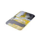 "Beschäftigte, beschäftigte" graue und gelbe Badematte (Schrägansicht)