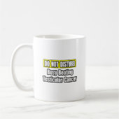 Besetzter Hodenkrebs Kaffeetasse (Links)